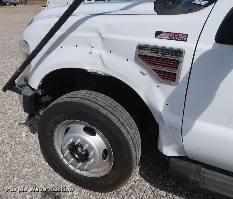 image for item GS9840 2008 Ford F550 Super Duty XLT flatbed truck with boom mower