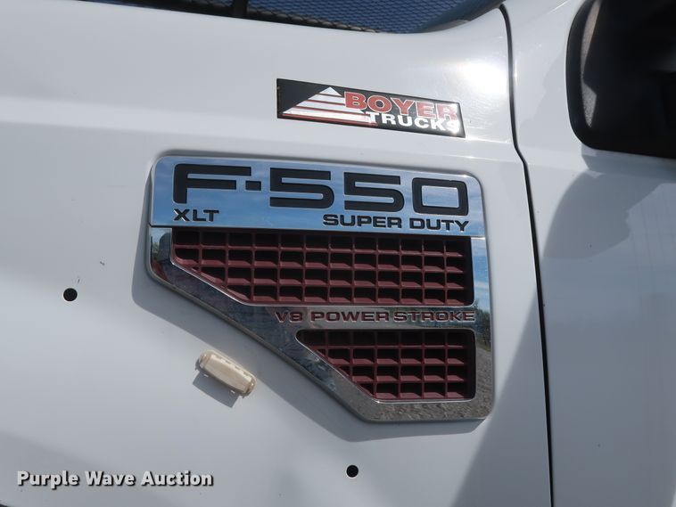 image for item GS9840 2008 Ford F550 Super Duty XLT flatbed truck with boom mower