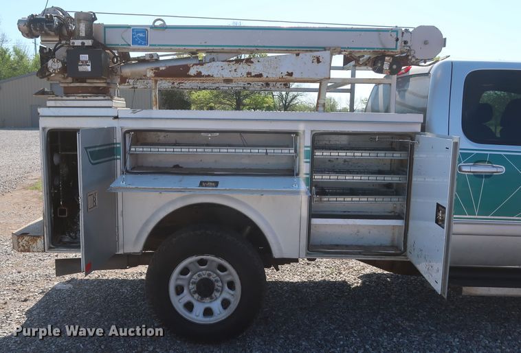 image for item GS9874 2011 Chevrolet Silverado 2500HD  Crew Cab utility bed pickup truck