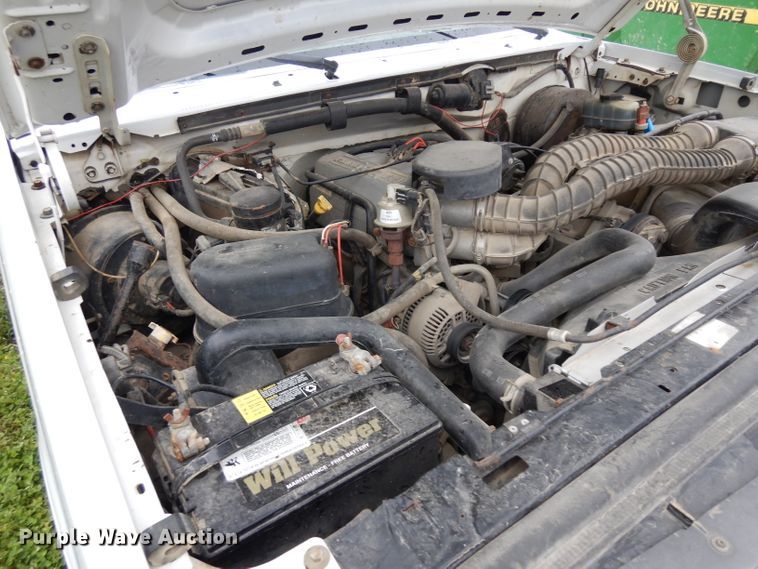 image for item GY9054 1997 Ford F250  flatbed pickup truck