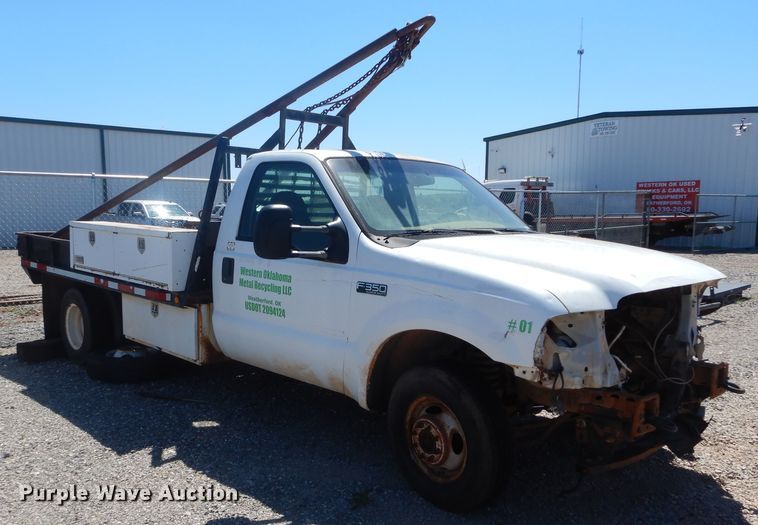 image for item HA9055 2001 Ford F350 Super Duty  flatbed pickup truck