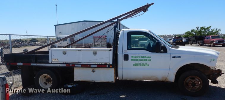 image for item HA9055 2001 Ford F350 Super Duty  flatbed pickup truck