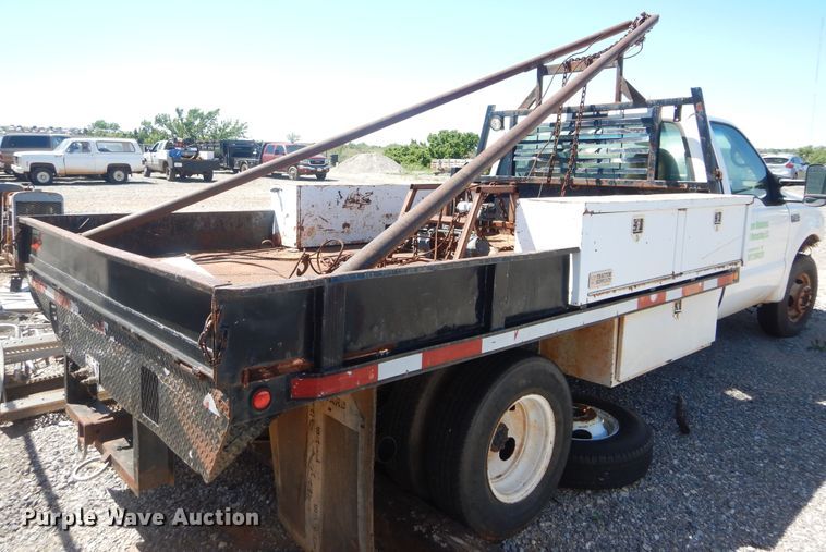 image for item HA9055 2001 Ford F350 Super Duty  flatbed pickup truck