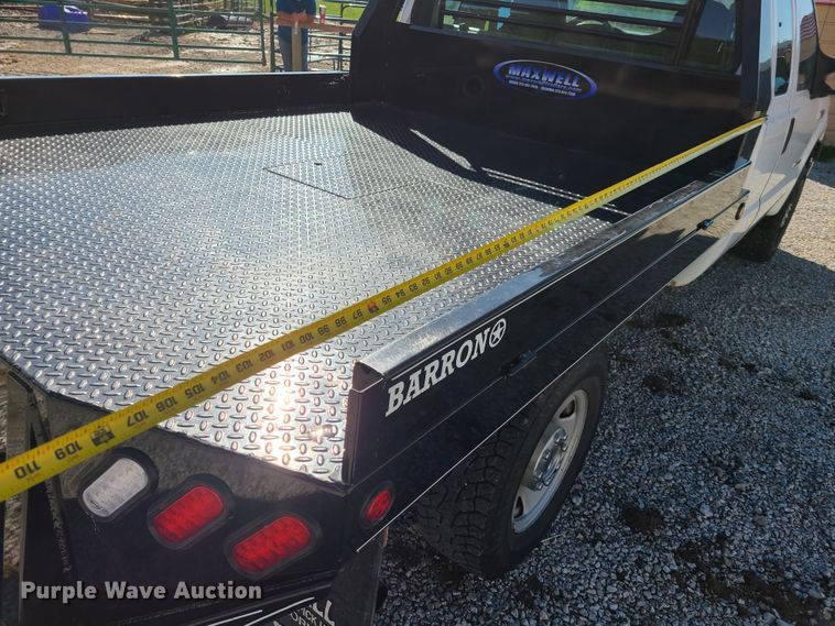 image for item K5829 2006 Ford F250 Super Duty  SuperCab flatbed pickup truck