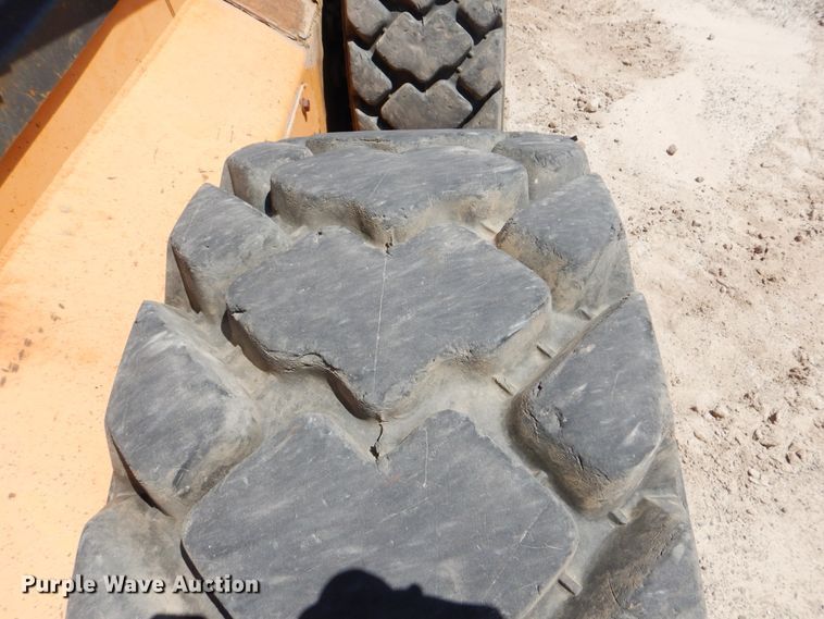 image for item DG8533 Case 435  skid steer loader