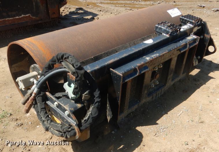 image for item DG8535 Caterpillar CV18B single drum vibratory skid steer roller