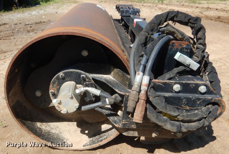 image for item DG8535 Caterpillar CV18B single drum vibratory skid steer roller