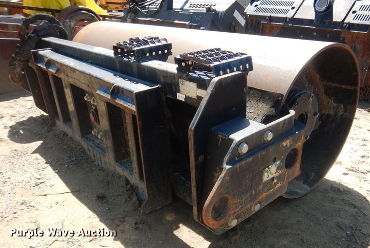 image for item DG8535 Caterpillar CV18B single drum vibratory skid steer roller