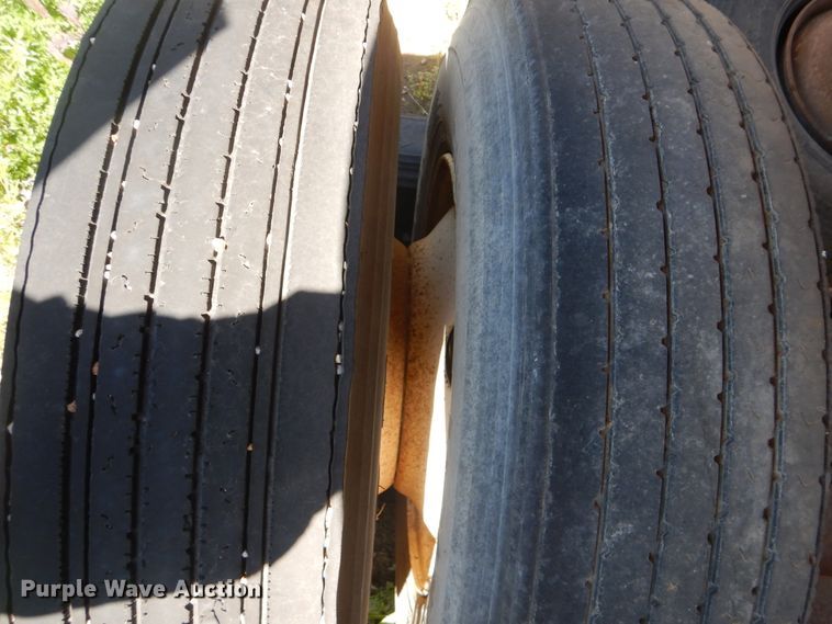 image for item DI2492 1999 Steco end dump trailer