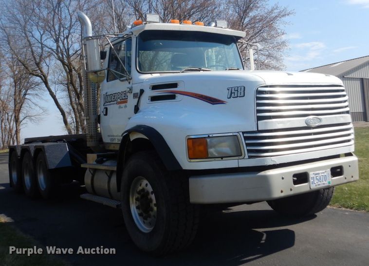 image for item GW9786 1995 Ford LTL9000 roll-off container truck