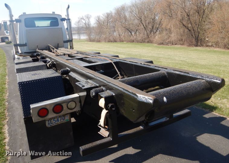 image for item GW9786 1995 Ford LTL9000 roll-off container truck