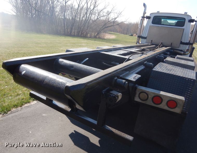 image for item GW9786 1995 Ford LTL9000 roll-off container truck