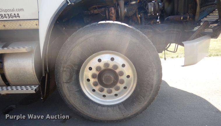 image for item GW9786 1995 Ford LTL9000 roll-off container truck