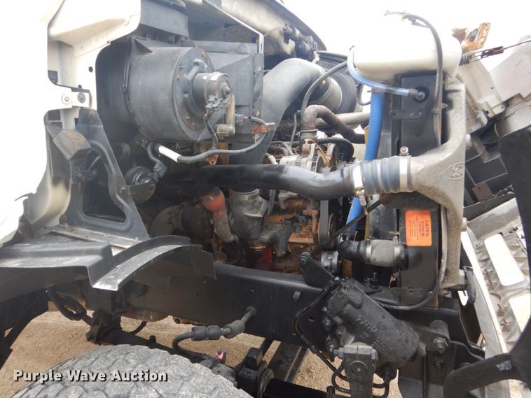 image for item GW9800 1998 Ford LNT8000 knuckle boom crane truck