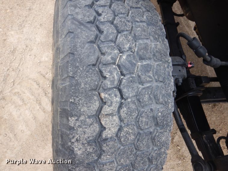 image for item GW9800 1998 Ford LNT8000 knuckle boom crane truck