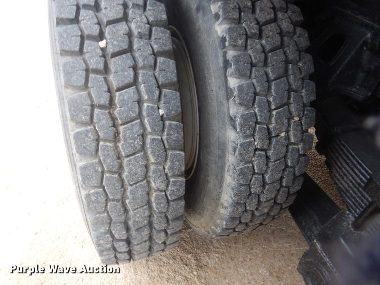 image for item GW9800 1998 Ford LNT8000 knuckle boom crane truck