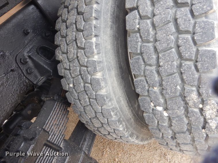 image for item GW9800 1998 Ford LNT8000 knuckle boom crane truck