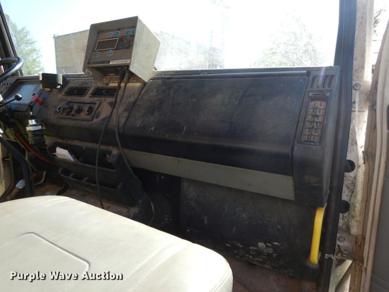 image for item DE5664 2001 Freightliner FL80 feed mixer truck