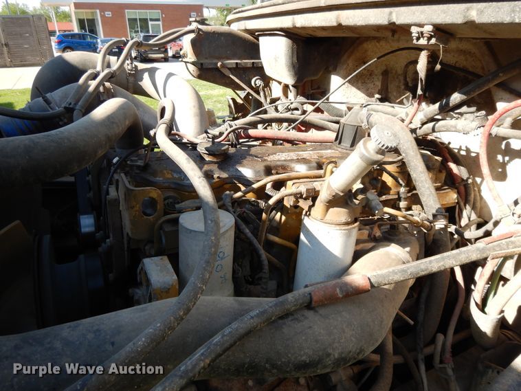 image for item DE5664 2001 Freightliner FL80 feed mixer truck