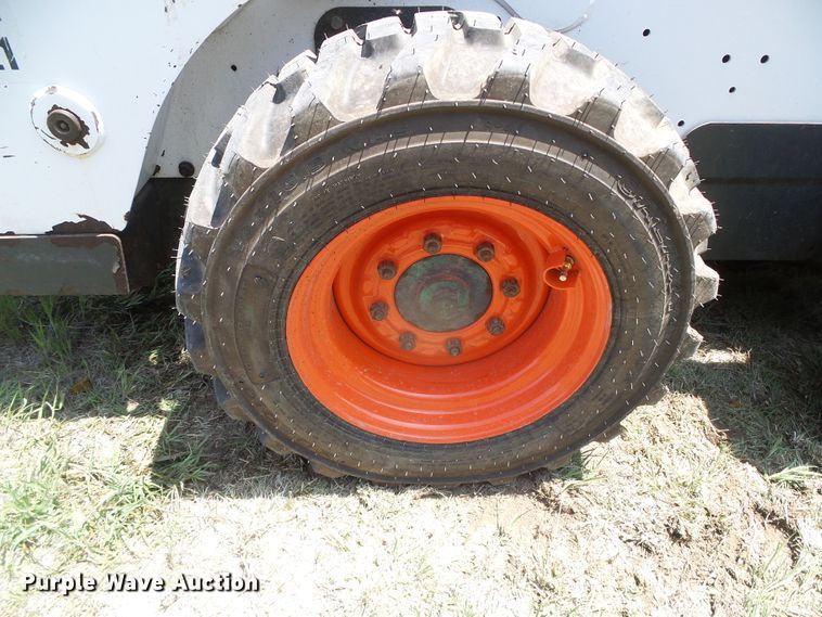 image for item DH4930 2015 Bobcat S590  skid steer loader