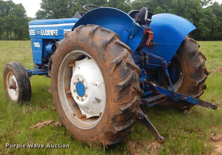 image for item GY9845 Long 310 tractor