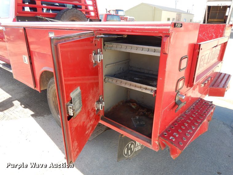 image for item DE5651 2014 Dodge Ram 3500HD  Crew Cab utility bed pickup truck