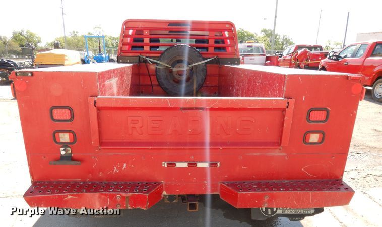 image for item DE5651 2014 Dodge Ram 3500HD  Crew Cab utility bed pickup truck