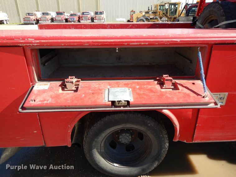 image for item DE5651 2014 Dodge Ram 3500HD  Crew Cab utility bed pickup truck