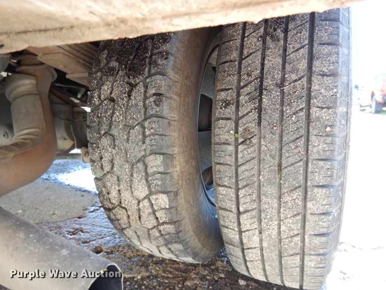 image for item DE5651 2014 Dodge Ram 3500HD  Crew Cab utility bed pickup truck