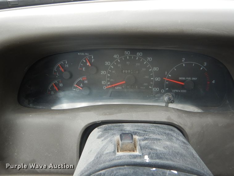 image for item DF3161 2001 Ford F550 Super Duty XL Crew Cab flatbed truck