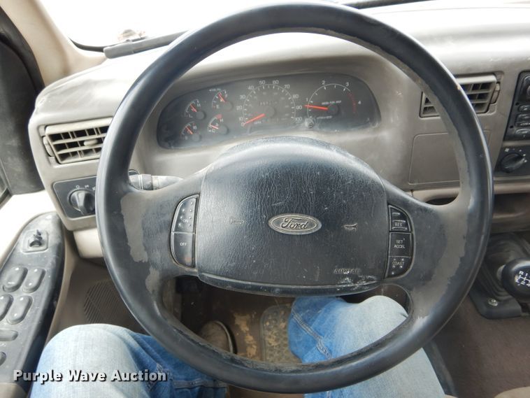 image for item DF3161 2001 Ford F550 Super Duty XL Crew Cab flatbed truck