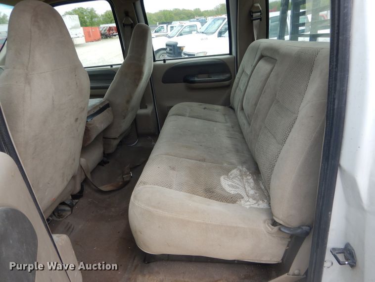 image for item DF3161 2001 Ford F550 Super Duty XL Crew Cab flatbed truck