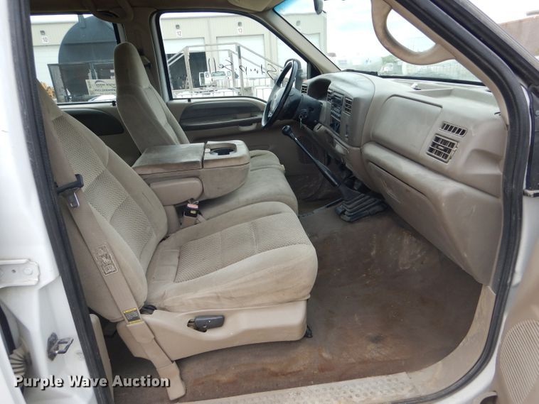 image for item DF3161 2001 Ford F550 Super Duty XL Crew Cab flatbed truck