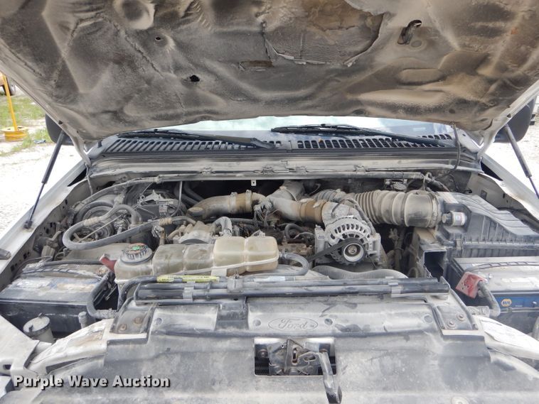 image for item DF3161 2001 Ford F550 Super Duty XL Crew Cab flatbed truck