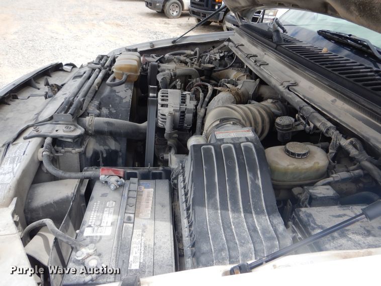 image for item DF3161 2001 Ford F550 Super Duty XL Crew Cab flatbed truck