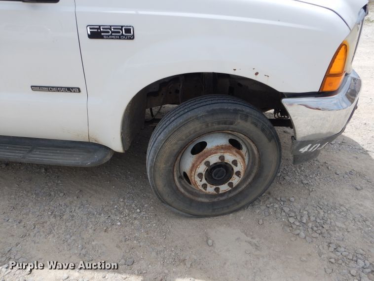 image for item DF3161 2001 Ford F550 Super Duty XL Crew Cab flatbed truck