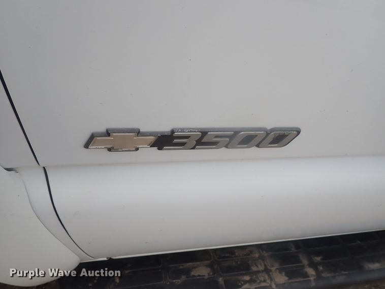 image for item DG3229 2004 Chevrolet Silverado 3500  Ext. Cab flatbed pickup truck