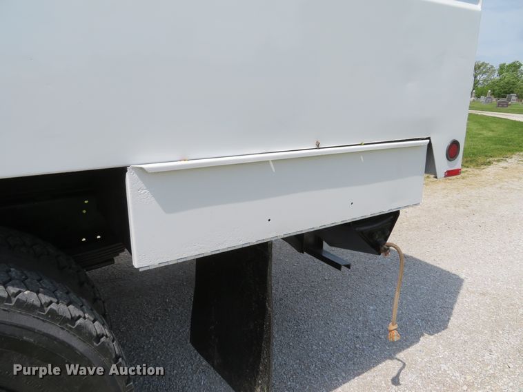 image for item DI2197 2004 GMC C6500  chip bed truck