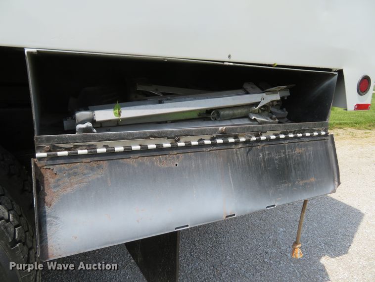 image for item DI2197 2004 GMC C6500  chip bed truck