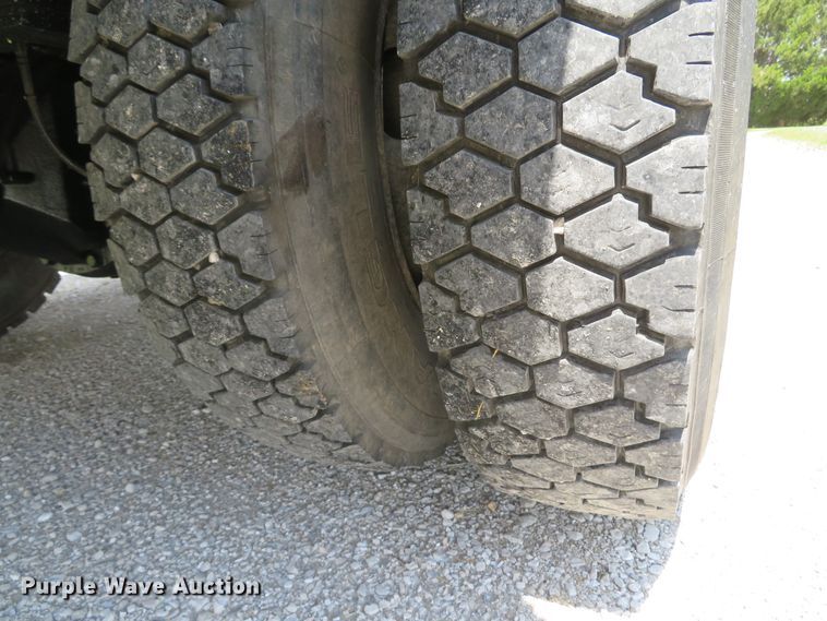 image for item DI2197 2004 GMC C6500  chip bed truck