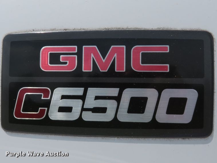image for item DI2197 2004 GMC C6500  chip bed truck