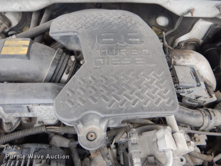 image for item GF9054 2004 Chevrolet Silverado 3500 Ext. Cab flatbed pickup truck