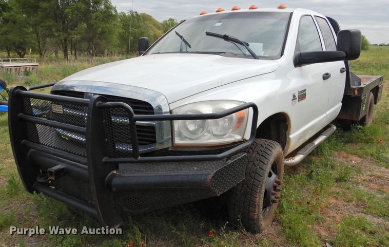 image for item GN9892 2009 Dodge Ram 3500HD  Quad Cab flatbed pickup truck