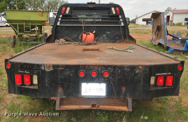 image for item GN9892 2009 Dodge Ram 3500HD  Quad Cab flatbed pickup truck