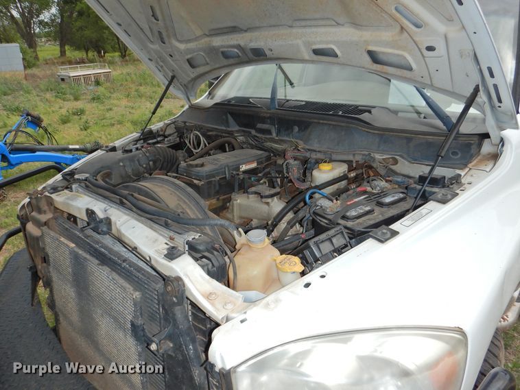 image for item GN9892 2009 Dodge Ram 3500HD  Quad Cab flatbed pickup truck