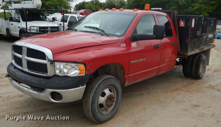 image for item GO9659 2003 Dodge Ram 3500  Quad Cab flatbed pickup truck