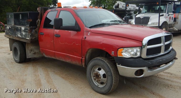 image for item GO9659 2003 Dodge Ram 3500  Quad Cab flatbed pickup truck