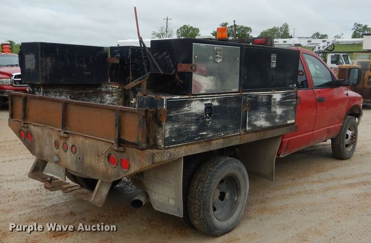 image for item GO9659 2003 Dodge Ram 3500  Quad Cab flatbed pickup truck