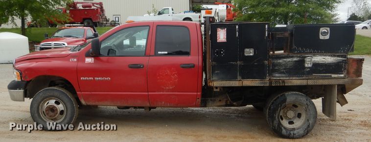 image for item GO9659 2003 Dodge Ram 3500  Quad Cab flatbed pickup truck