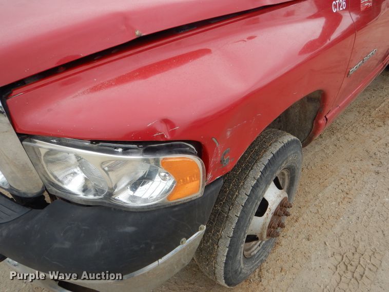 image for item GO9659 2003 Dodge Ram 3500  Quad Cab flatbed pickup truck